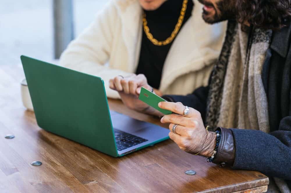 business partners making online payment using lapt 2026 01 07 00 21 19 utc Large