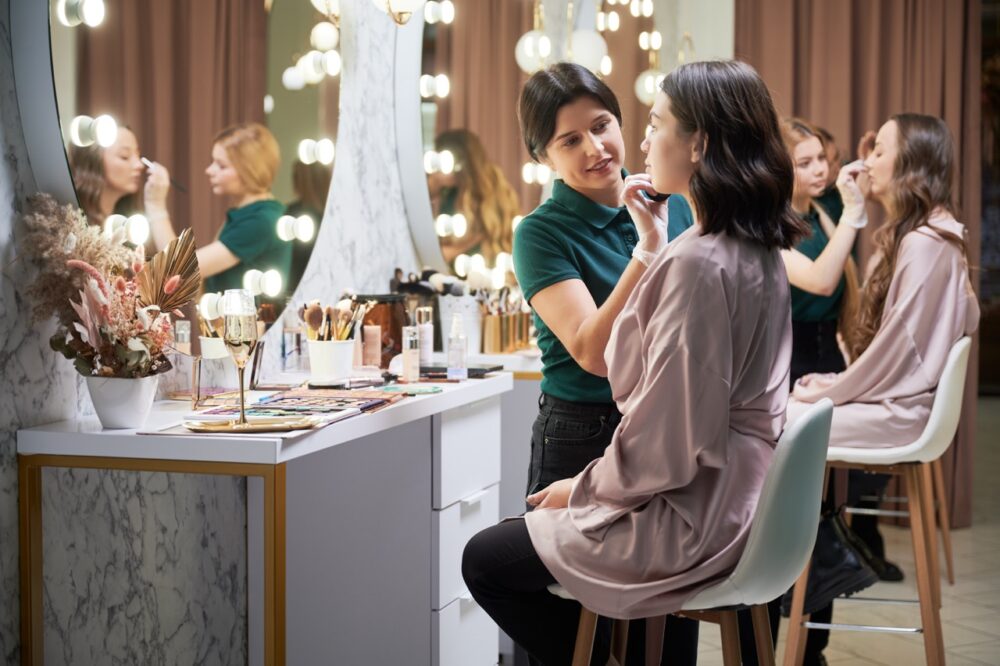 makeup artist applying foundation on woman face in 2026 03 17 01 41 34 utc Large