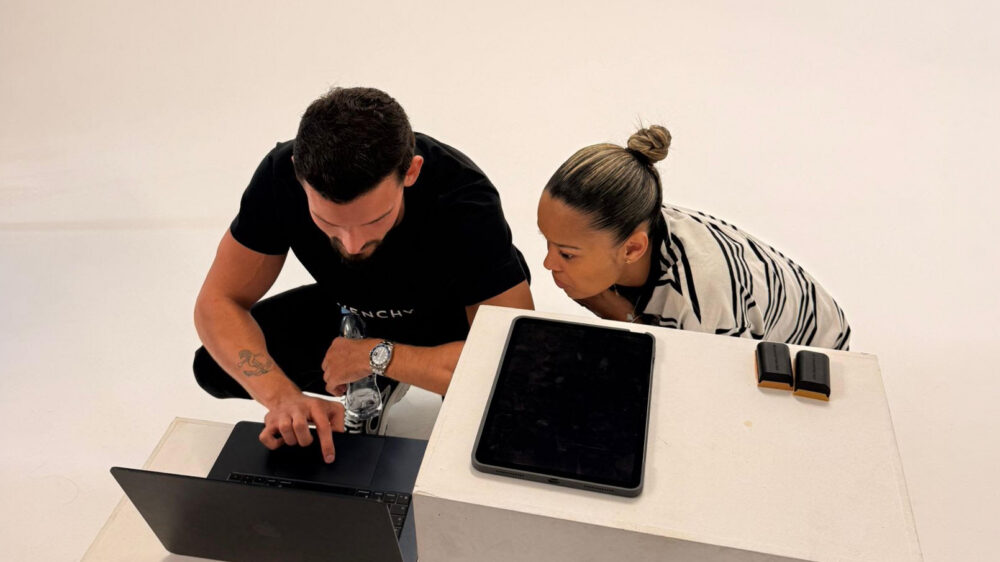 Q&A: Eri Krasniqi And Scarlett Abrahams, HikersIsland 1 Eri Krasniqi And Scarlett Abrahams, HikersIsland looking at a laptop