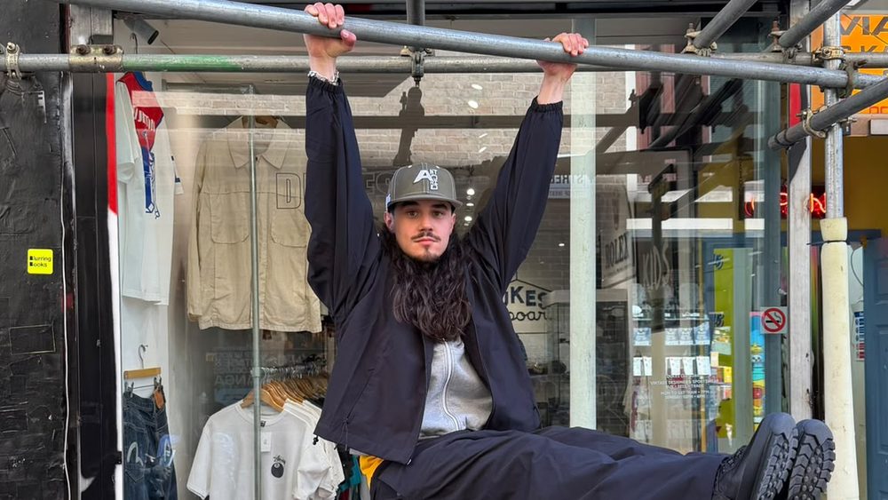 Champion Takes Archive to London Car Boots for Community Campaign 1 Dukes 02 hanging legs up 1920x1080
